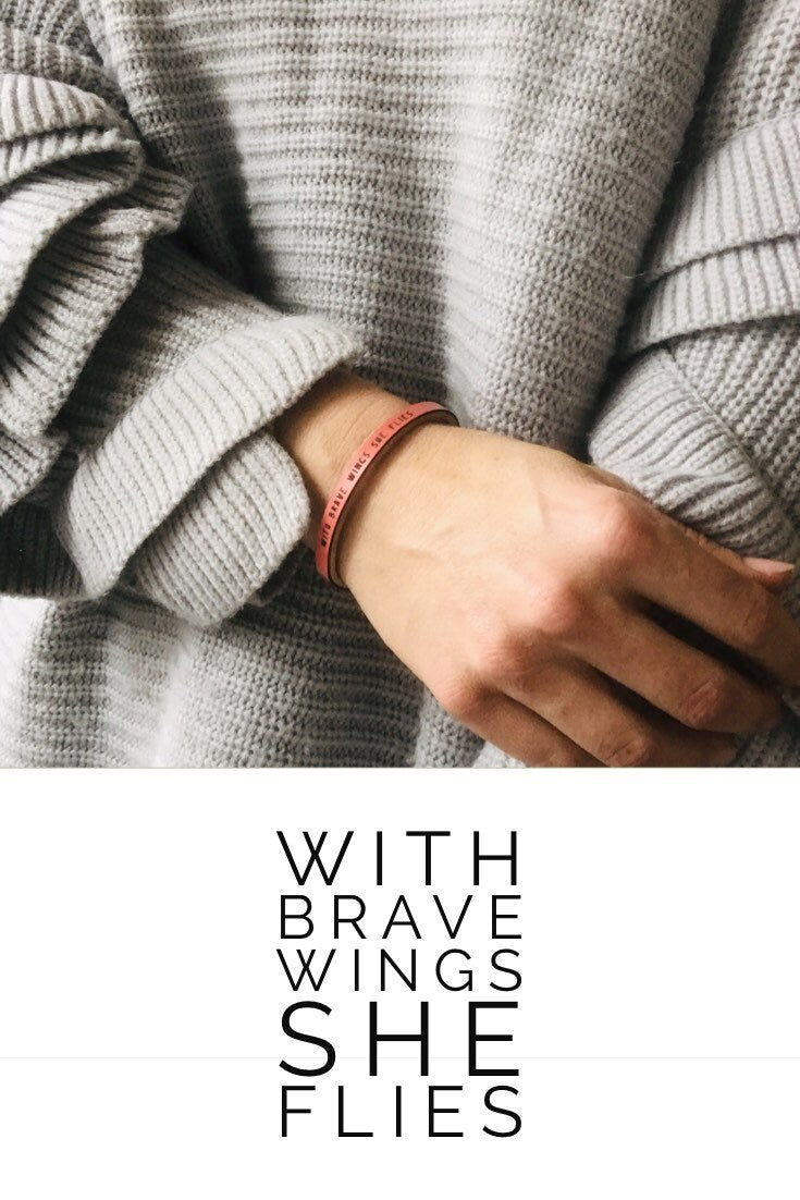 with brave wings she flies... Leather Bracelet